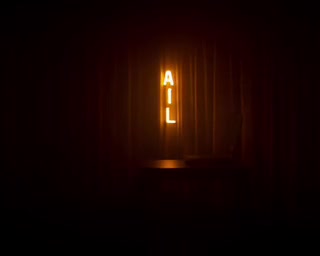 2AM Motel Room Debugging music video poster — neon motel sign